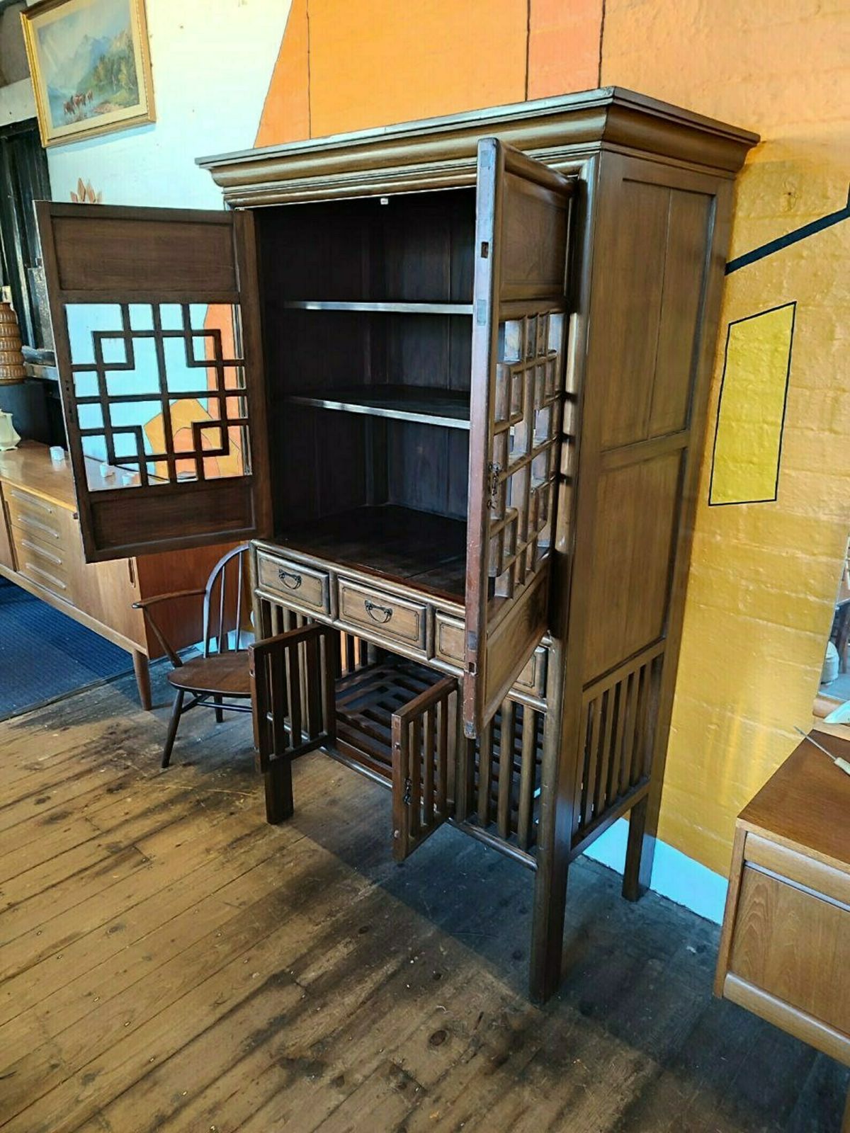 Vintage Qing Dynasty Style Elmwood Cabinet With Fretwork And Floral Motifs photo for sale