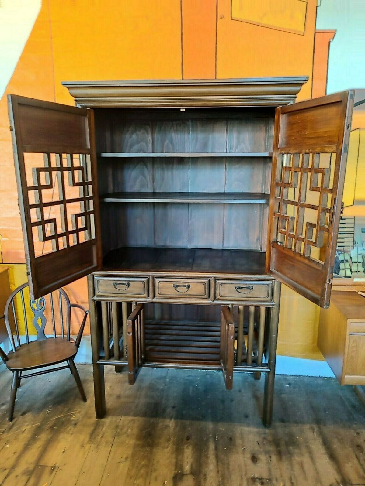 Vintage Qing Dynasty Style Elmwood Cabinet With Fretwork And Floral Motifs photo Furniture
