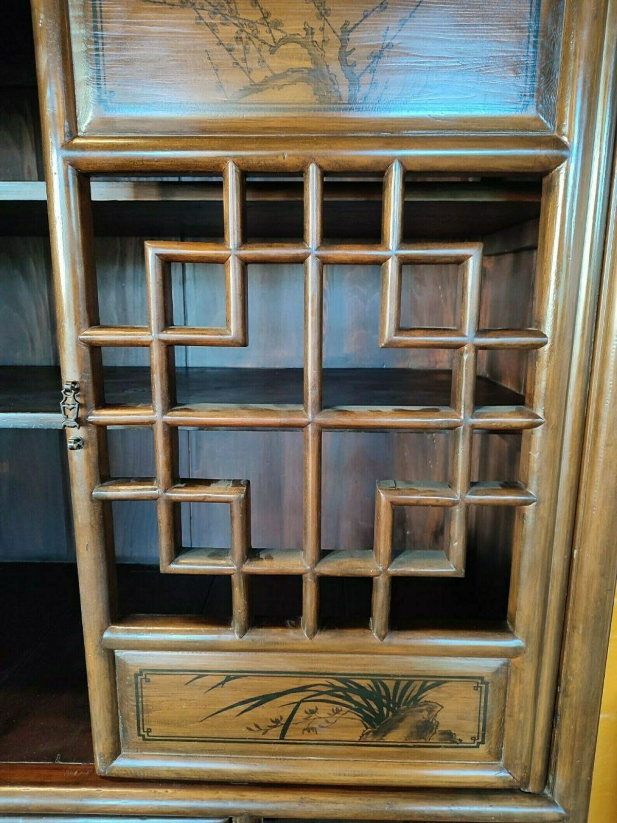 photo furniture Vintage Qing Dynasty Style Elmwood Cabinet With Fretwork And Floral Motifs