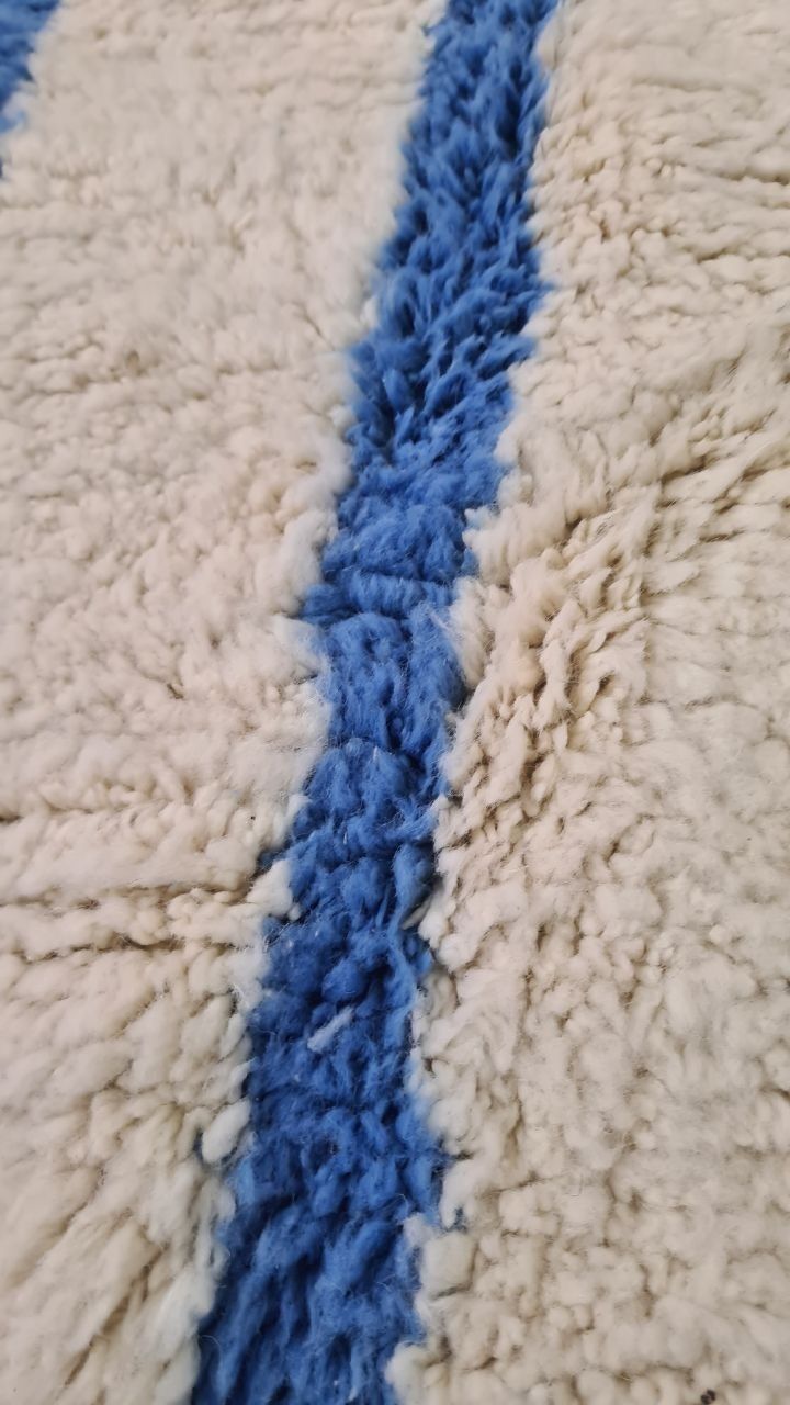 Handmade Berber Beni Ourain Rug With Minimalist Blue Line Design – 250x150 Cm photo vinterior