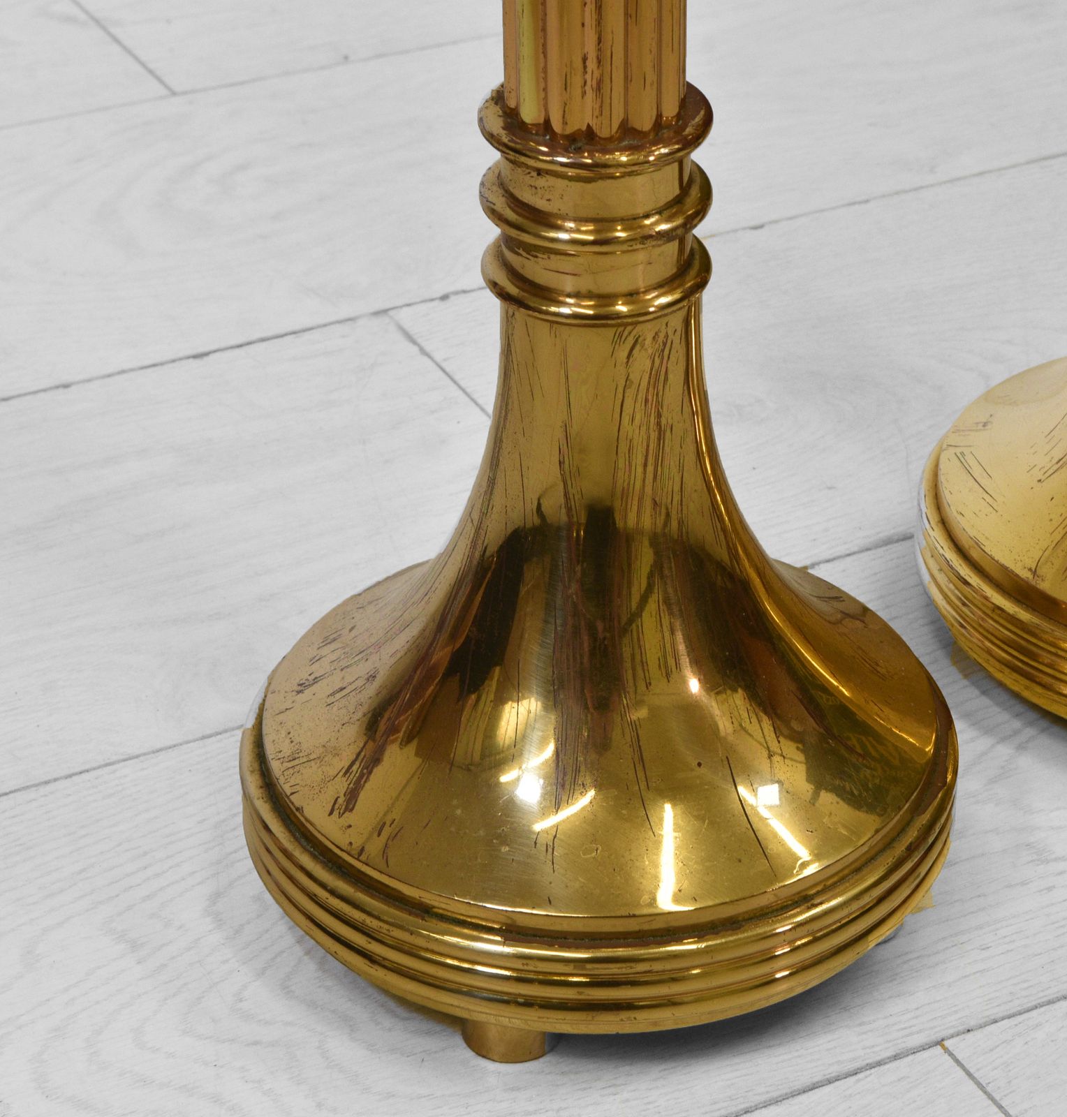 Pair Of Brass Floor Standing Candle Stands With Flared Scalloped Uppers B photo vinterior
