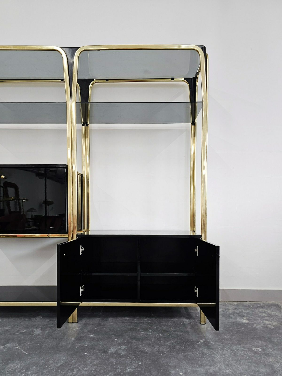 Hollywood Regency Black Lacquered Shelving Or Wall Unit With A Bar And A Cabinet // Made In Italy In 1980s photo for sale
