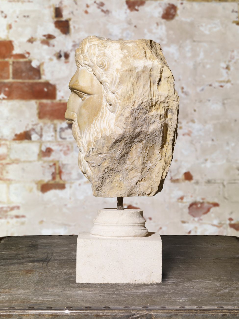 Carved Stone Head Of Hercules. photo Garden Decor