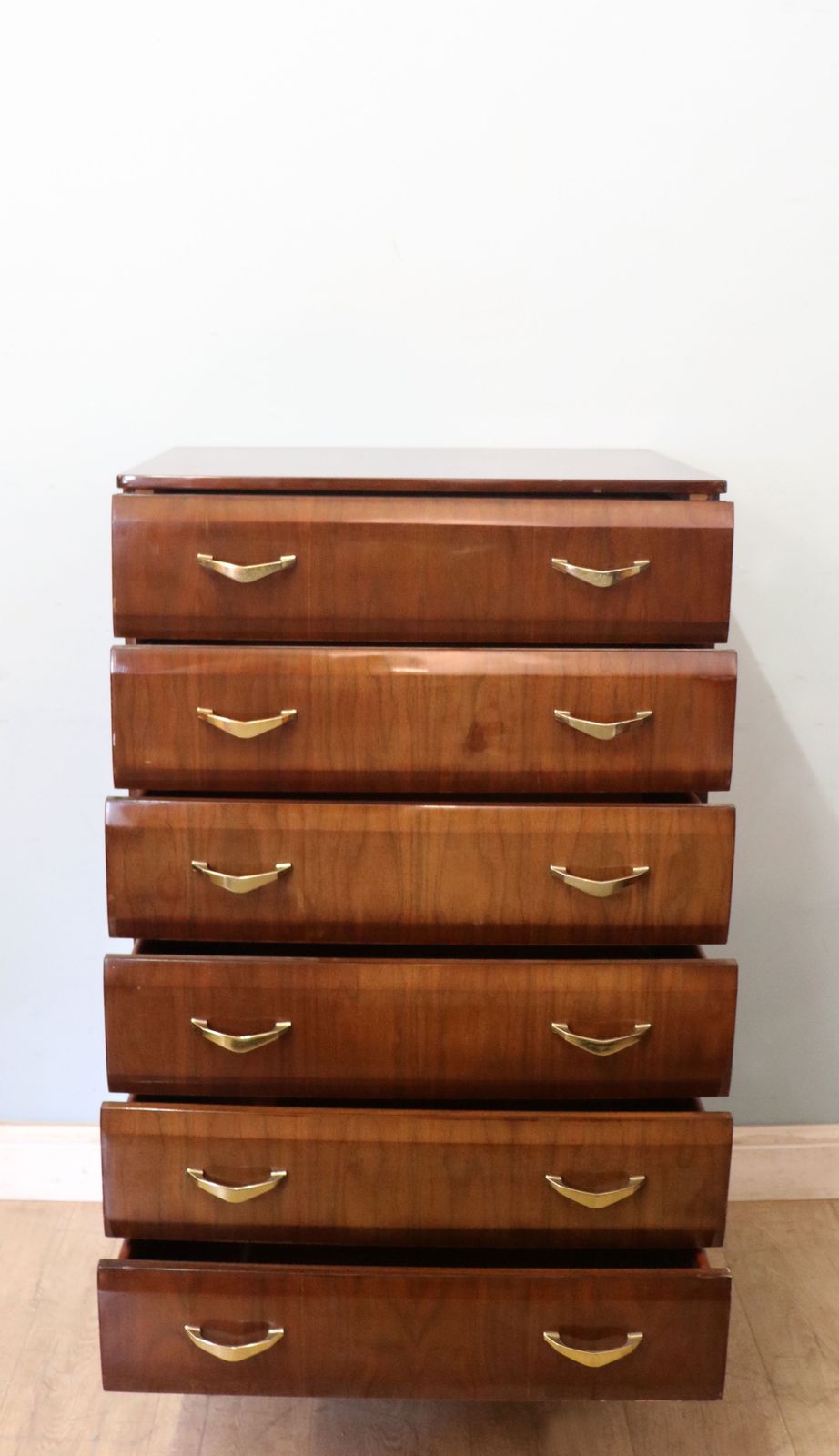A Lovely Mid Century Bedroom Chest Of Drawers With Walnut Veneer And High Gloss Finish. photo furniture