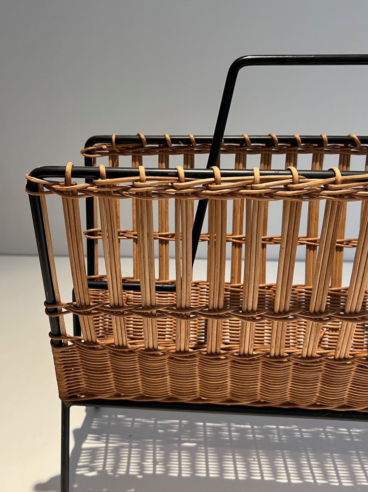 Black Lacquered Metal And Rattan Magazine Rack photo vintage