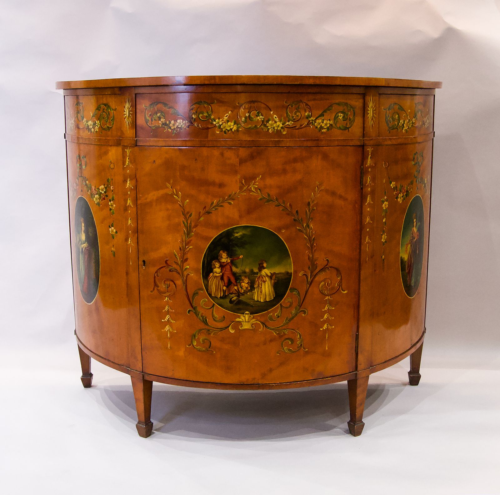 A Satinwood Painted Demi Lune Cabinet photo for sale
