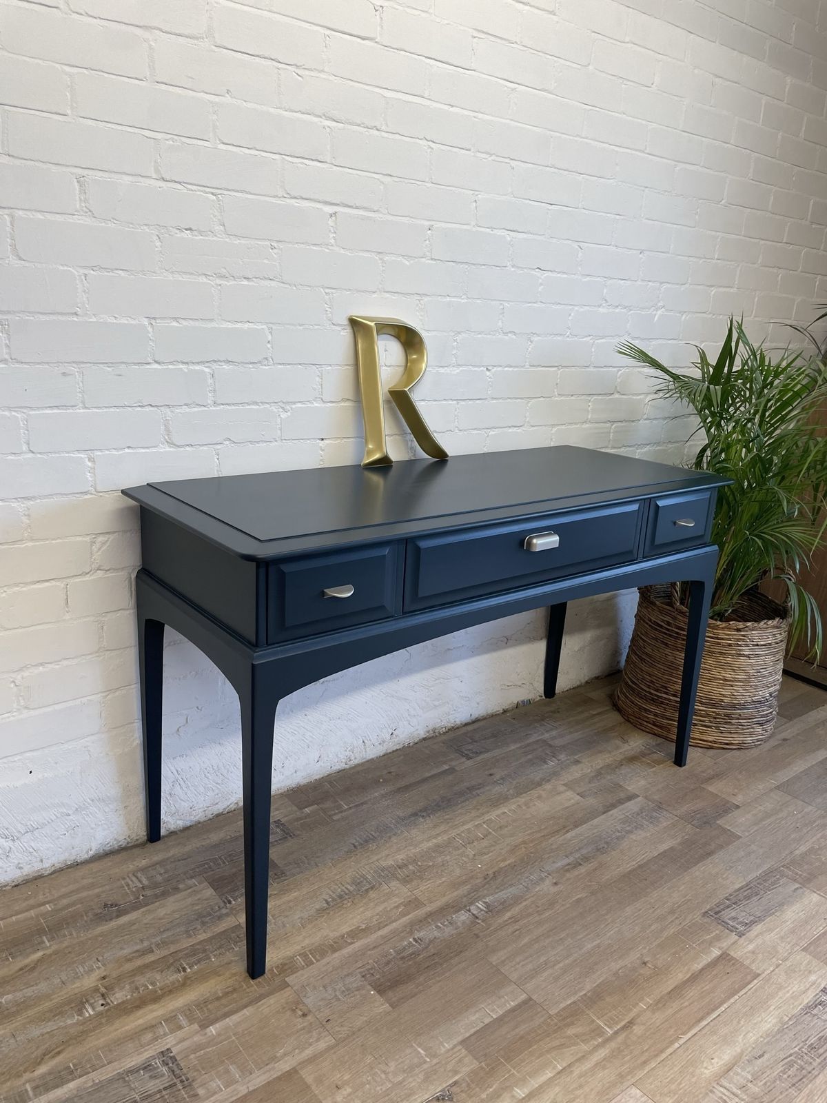 575.0 Stag Minstrel 3 Drawer Console Table photo