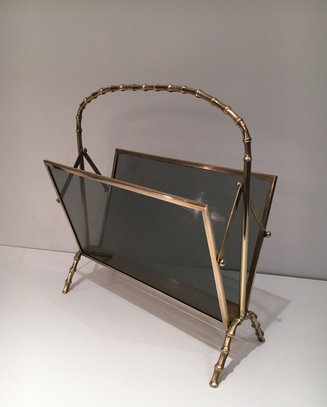 photo buy Faux Bamboo Style Magazine Rack In Brass From Maison Baguès