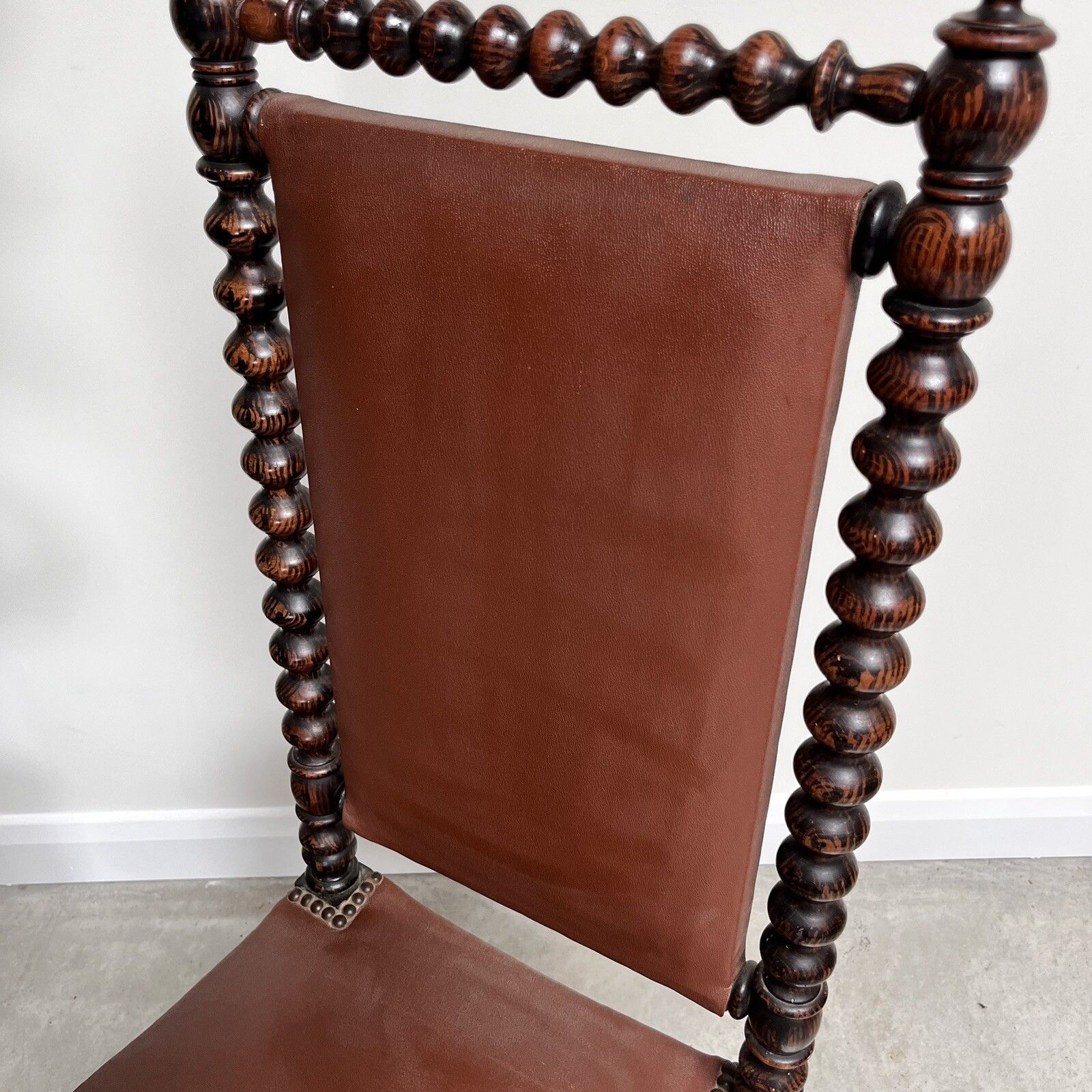 photo furniture French 19th Century Bobbin Turned Ebonised Nursing Chair Studded Red Leather