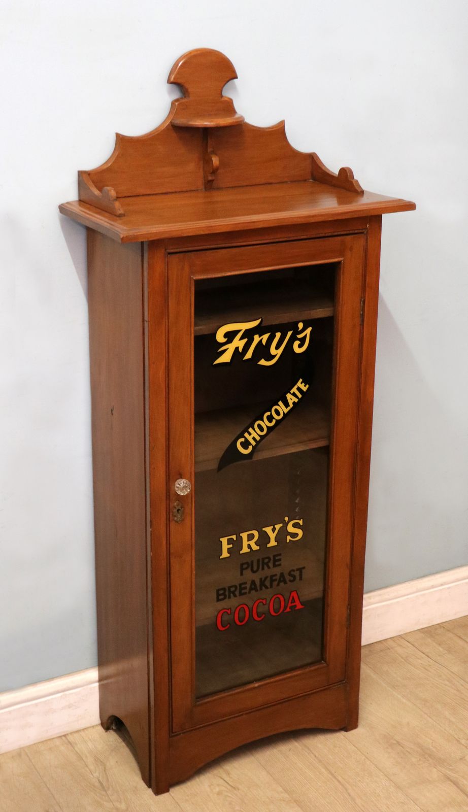 A Wonderful Victorian American Walnut Glazed Cabinet, Later Hand Sign Written Advertising For Fry's Chocolate. photo vinterior
