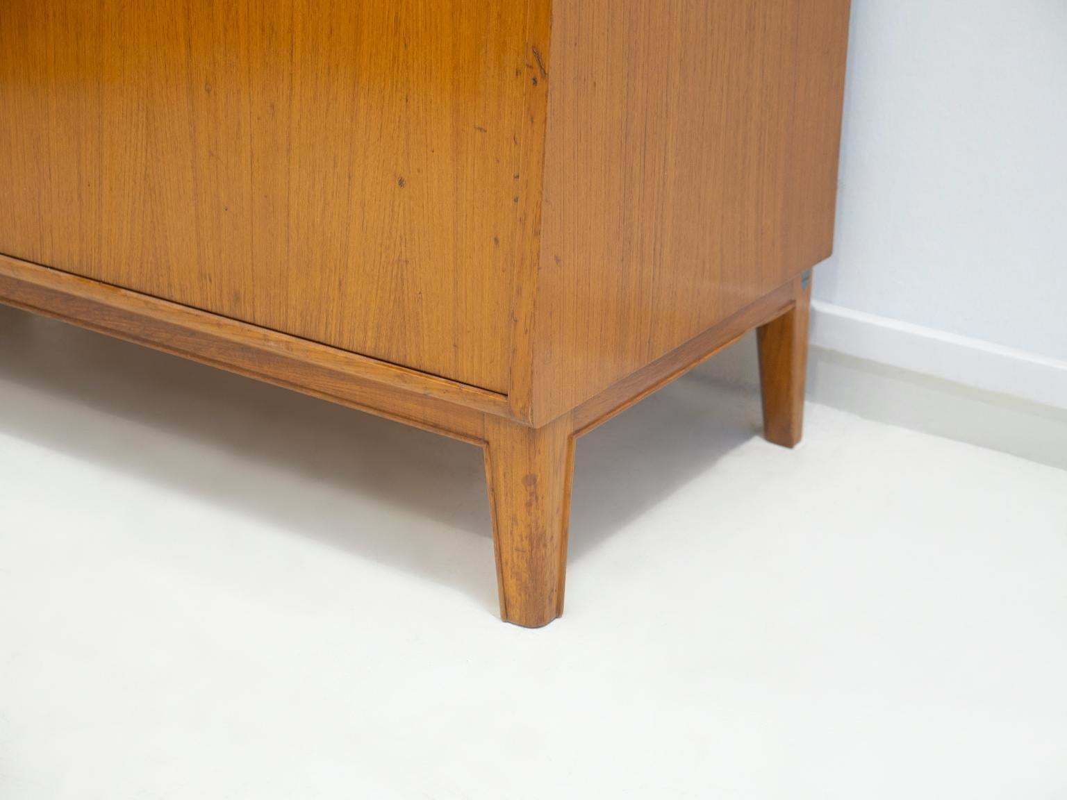 photo furniture Teak Veneered Cabinet With Sliding Doors And Roll Up Flap