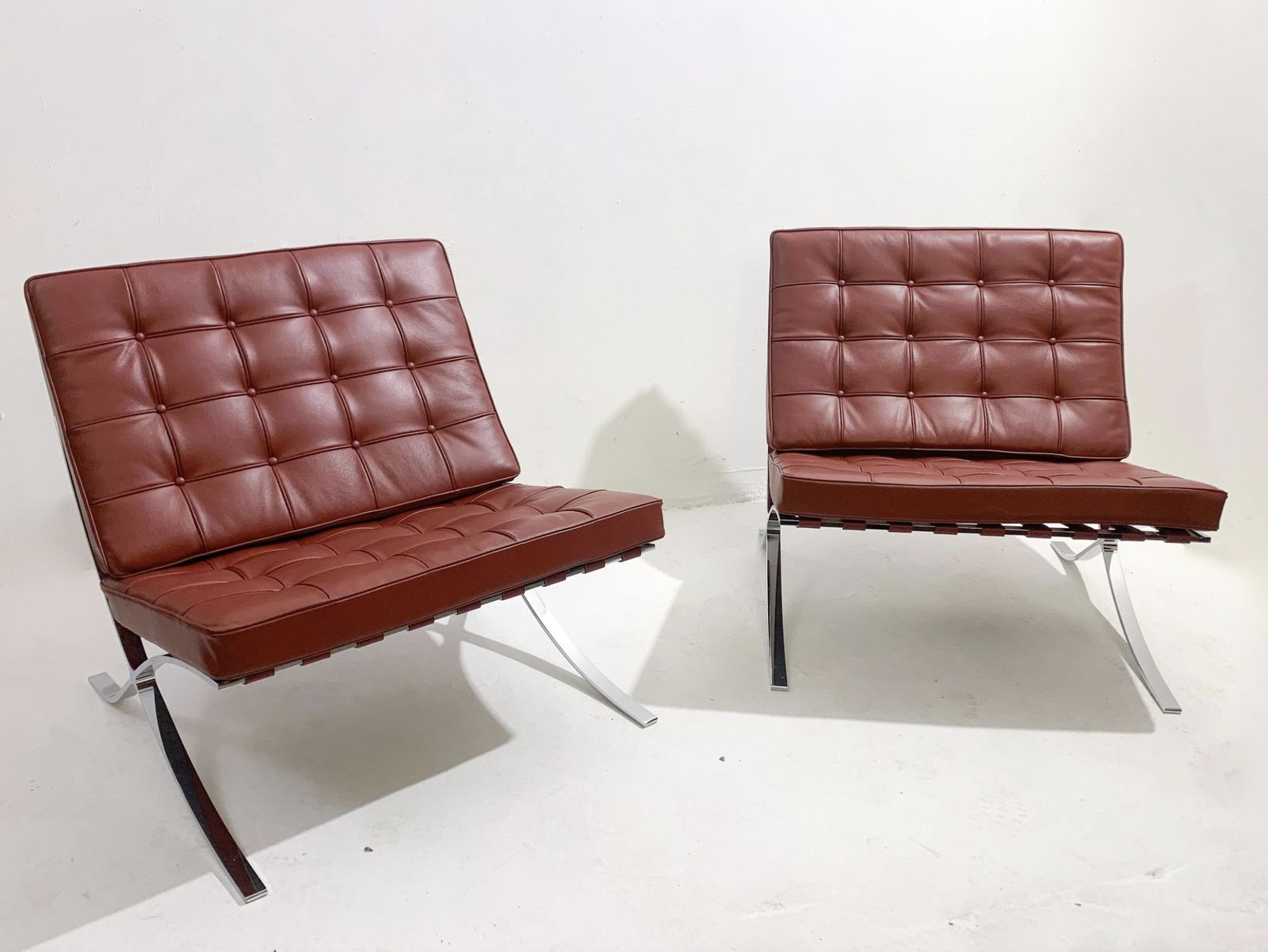 Pair Of Burgundy Leather Barcelona Chairs By Mies Van Der Rohe For Knoll, 1990s photo furniture