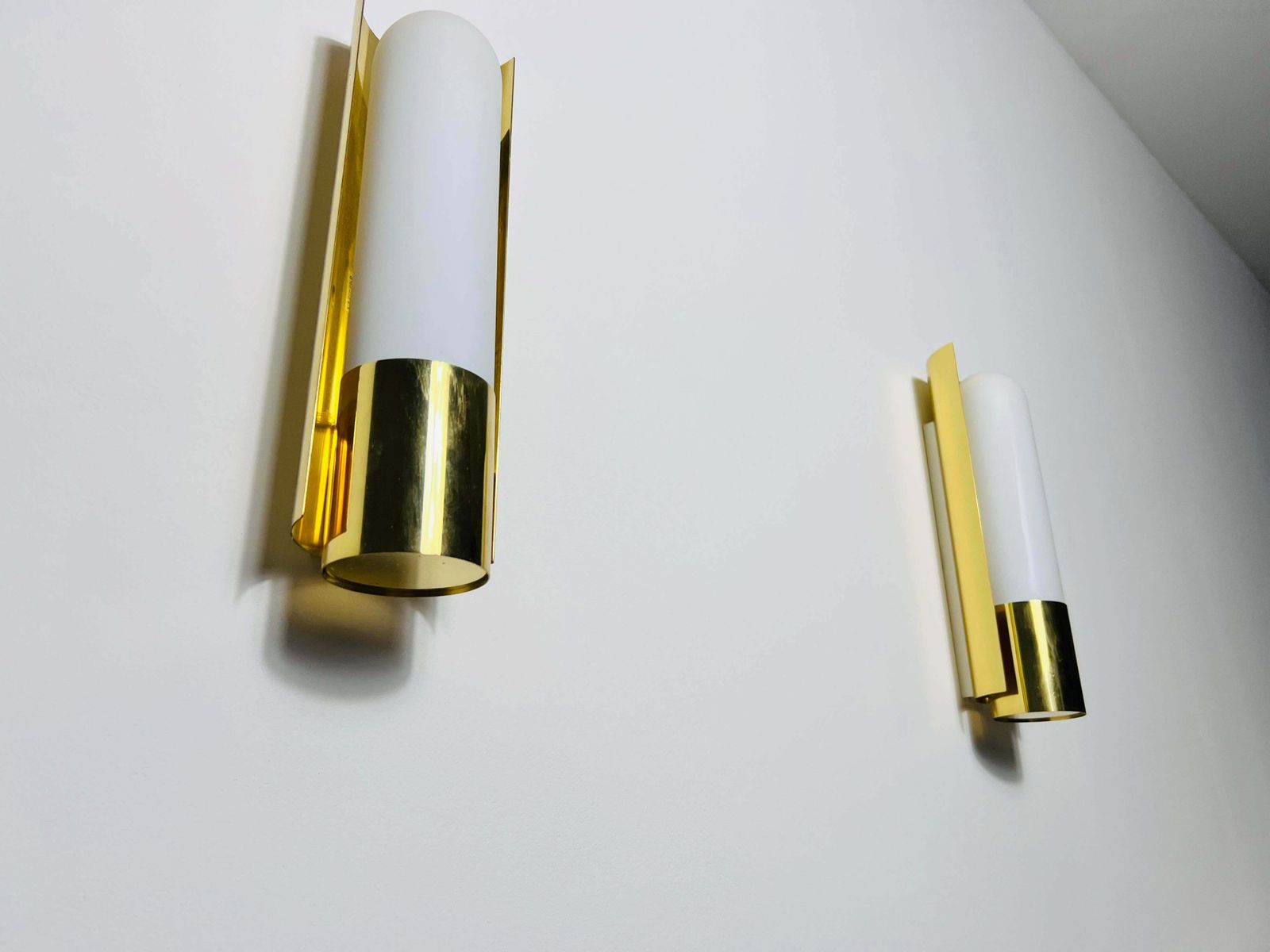 photo for sale Pair Of Brass And Opaline Glass Wall Lamps By Glashütte Limburg, 1960s