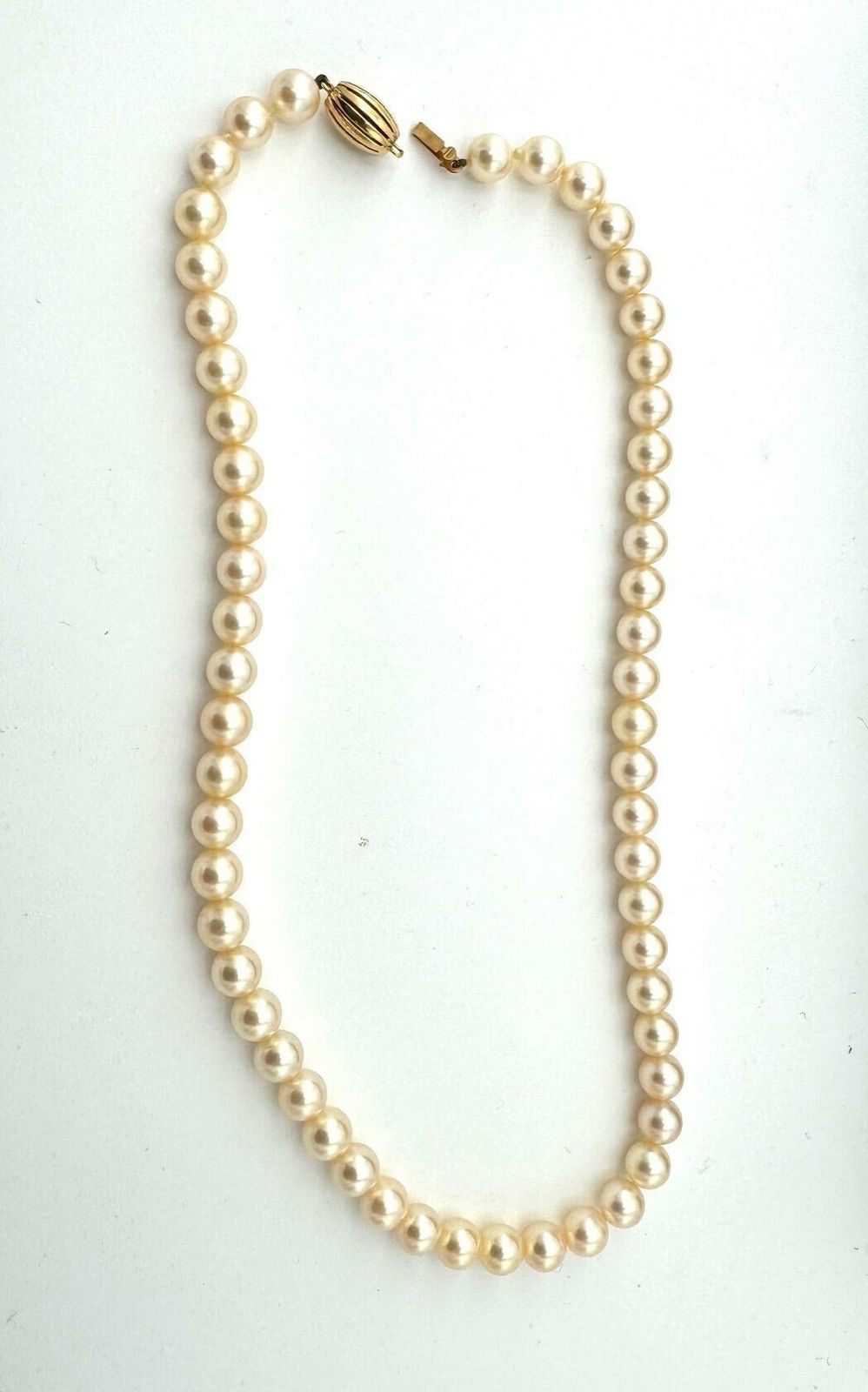 A Lovely Late 1980s Mappin And Webb Akoya Pearl Necklace With 18carat Gold Clasp In Orignal Box photo furniture