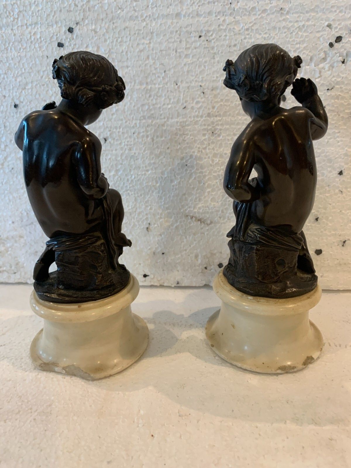 photo furniture Pair Of Bronze Putti With Brown Patina On White Marble Base 20th Century