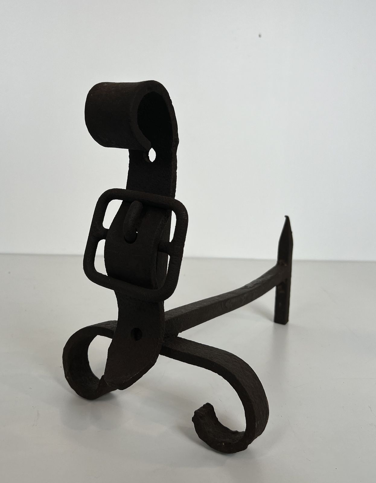 Pair Of Modernist Andirons Representing A Belt photo vinterior