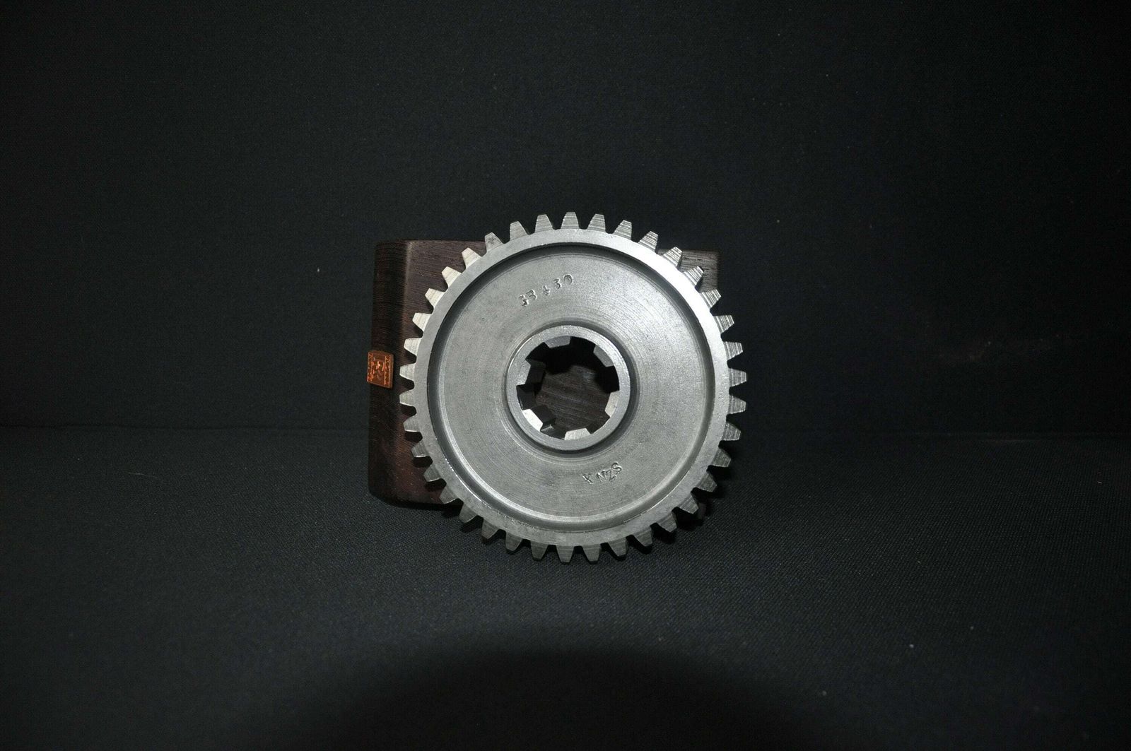 Rolls Royce Car Engine Gear On Hard Wood Base photo buy