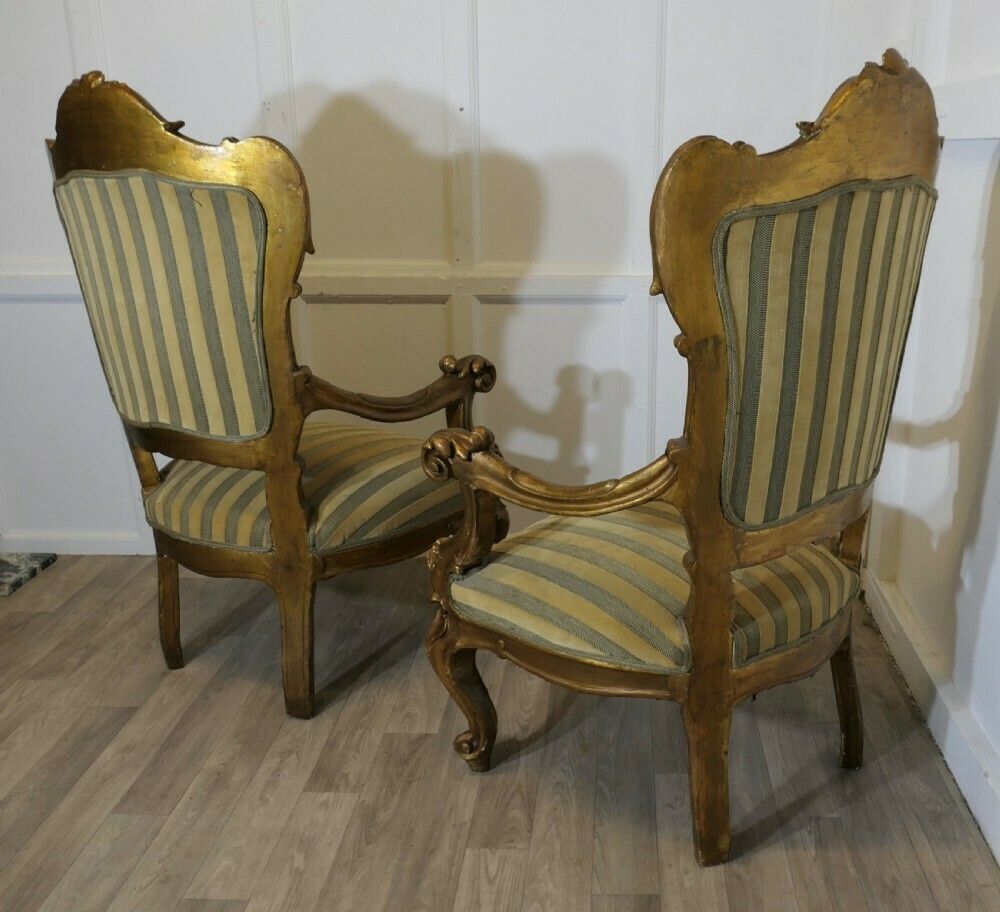 1740.0 A Pair Of Large Italian Carved Giltwood Arm Chairs photo