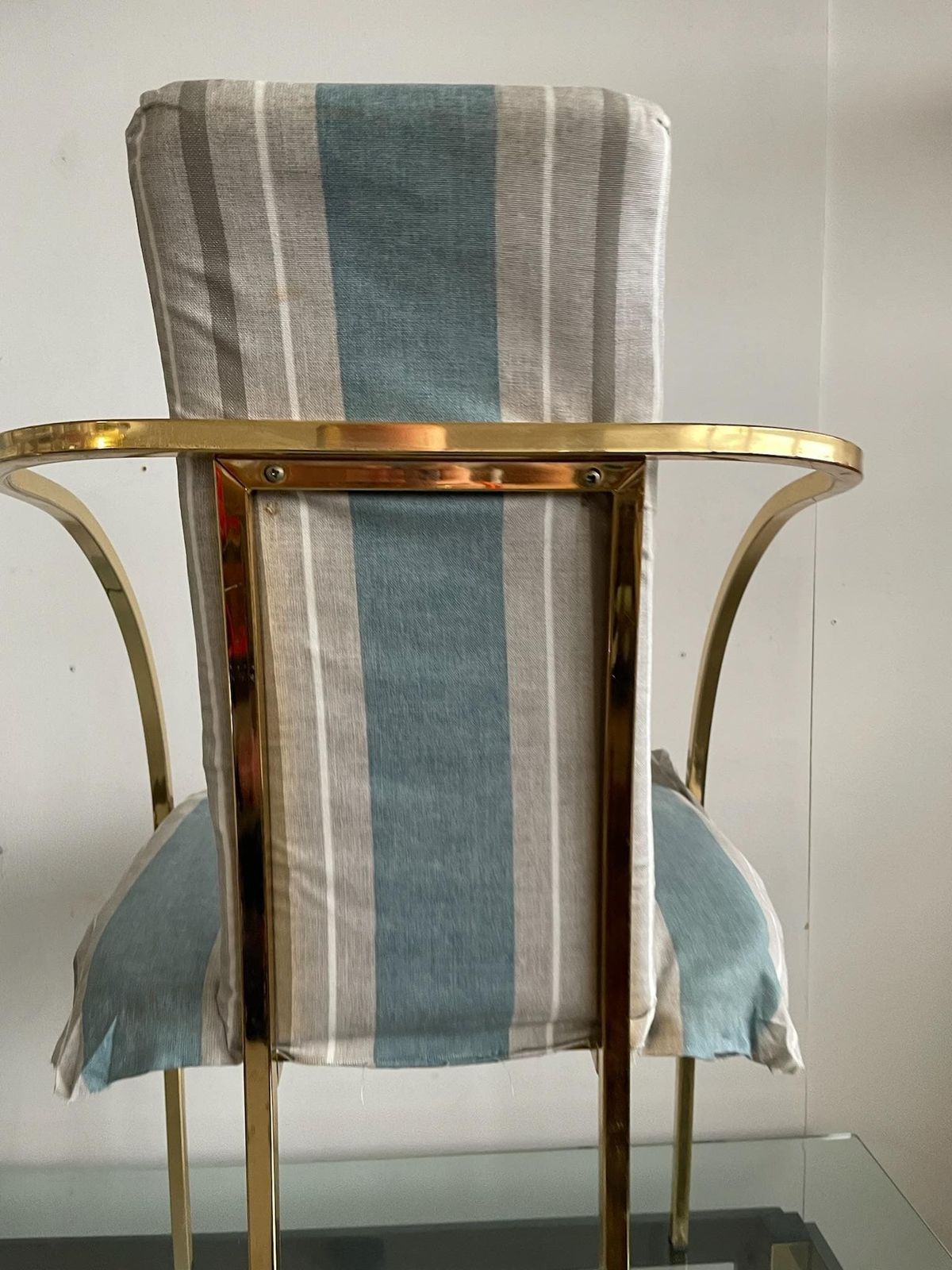 Sweeping Curved Arms That Meet At The Back And Form The Support And Legs. photo buy