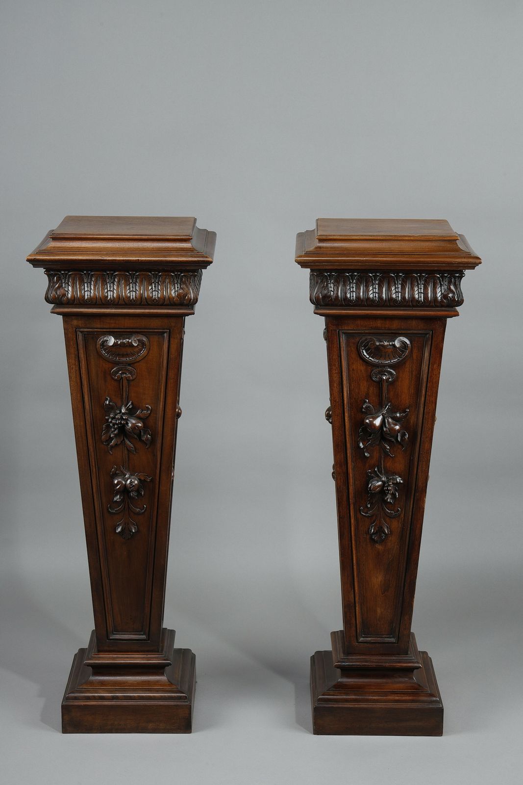 Pair Of Carved Molded Walnut Sellettes With Fruit And Plant Decorations photo furniture