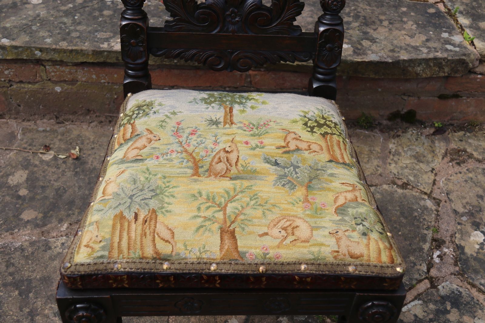 675.0 A 19th Century English Country House Carved Walnut High Backed Chair With A Tapestry Seat photo