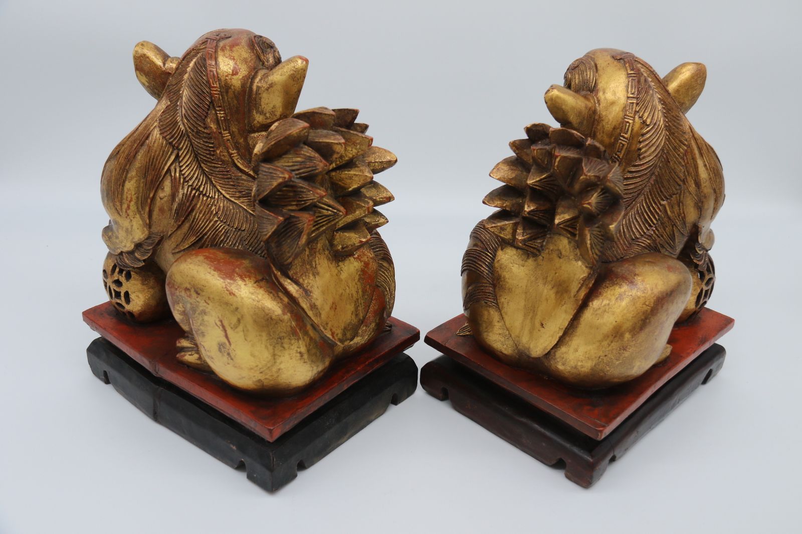 A Highly Decorative Pair Of Carved Gilt Wood And Lacquer Chinese Buddhist Lions Circa 1900 photo for sale