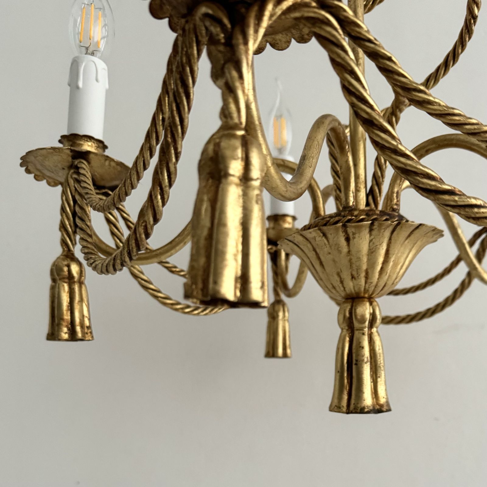 A Vintage Italian Gilt Rope And Tassel Chandelier photo for sale