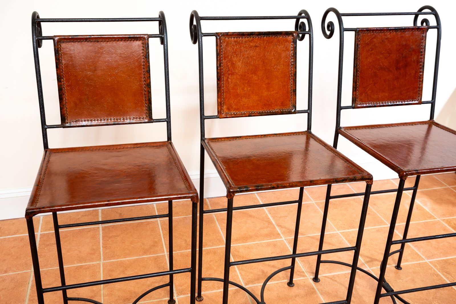 photo vinterior 3 Ralph Lauren Barstools Tan Leather Wrought Iron High Bar Stools Neoclassical Designer Artisan Forged Hand Stitched Curule Art D.Eco