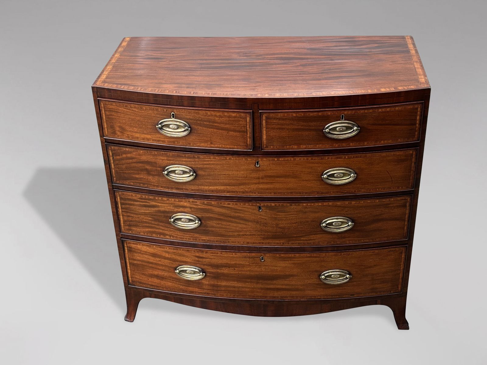 photo for sale 19th Century Bow Front Mahogany Inlay Chest Of Drawers