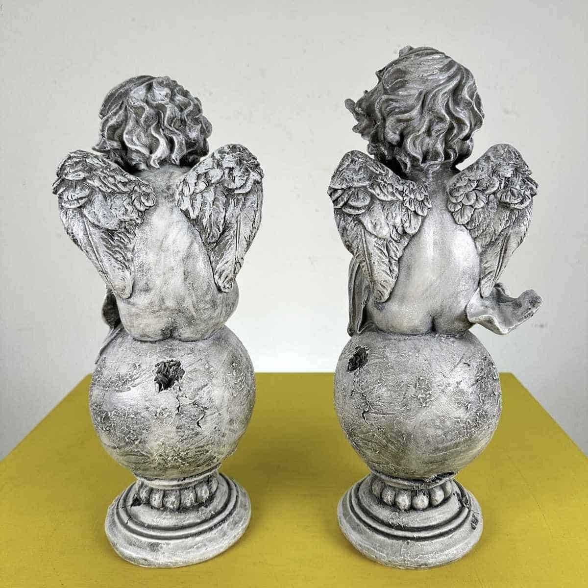 Pair Of Cherubs On Resin Sphere Pedestal photo vinterior