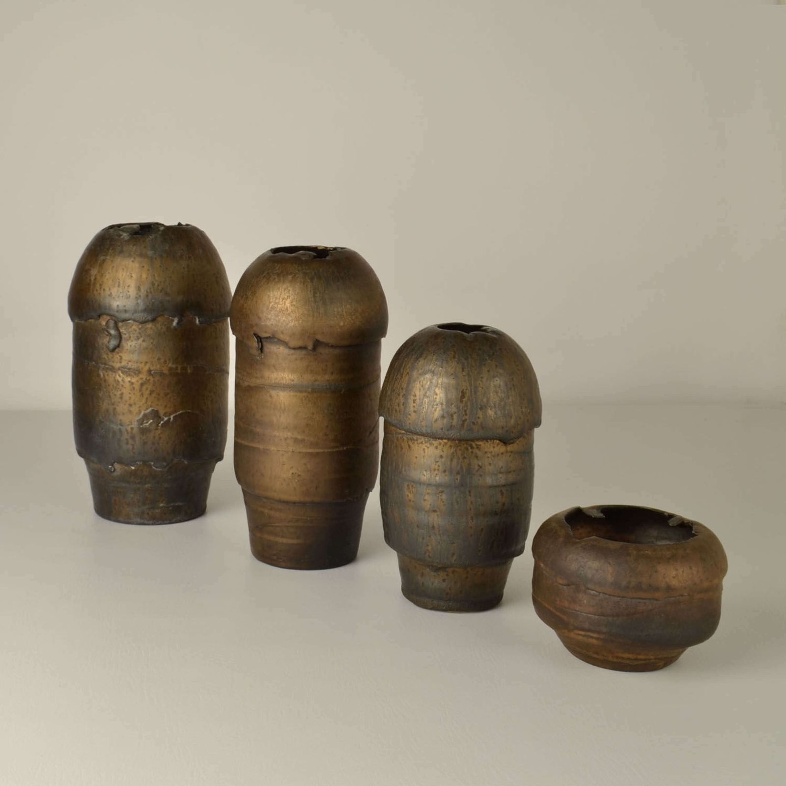photo furniture Group Of Bronze Ceramic Vases By Jaan Mobach