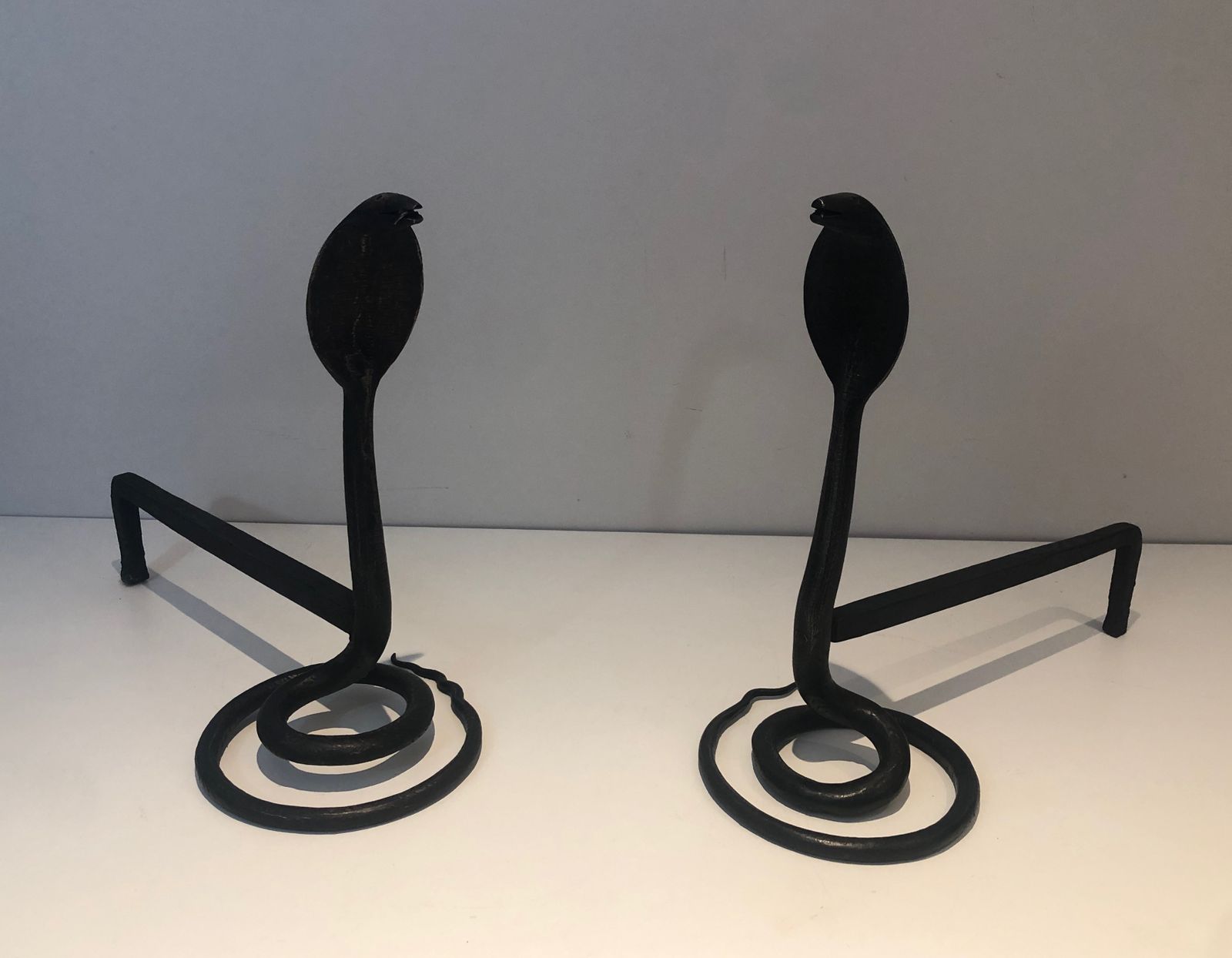 Pair Of Wrought Iron Cobra Andirons In The Style Of Edgar Brandt