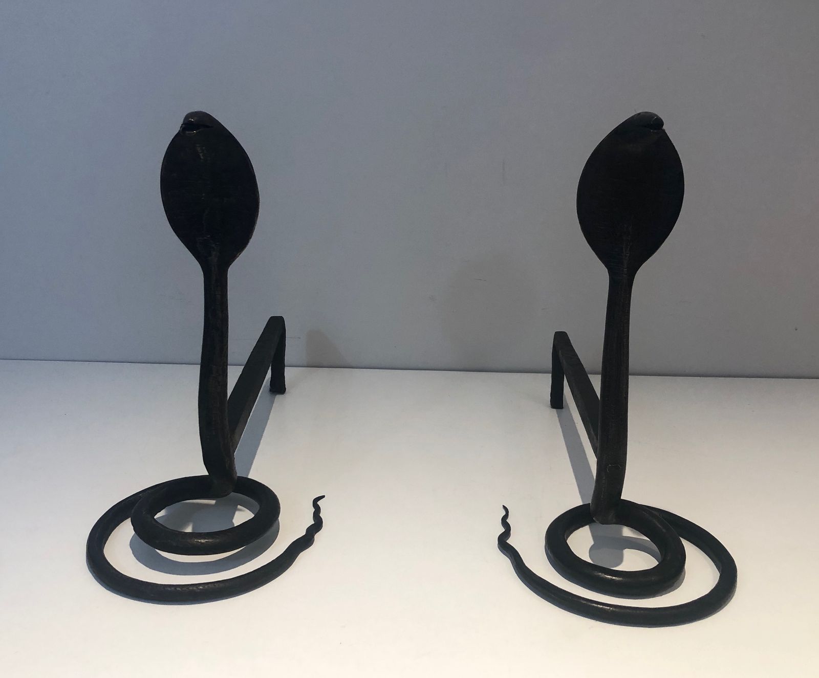 Pair Of Wrought Iron Cobra Andirons In The Style Of Edgar Brandt photo furniture