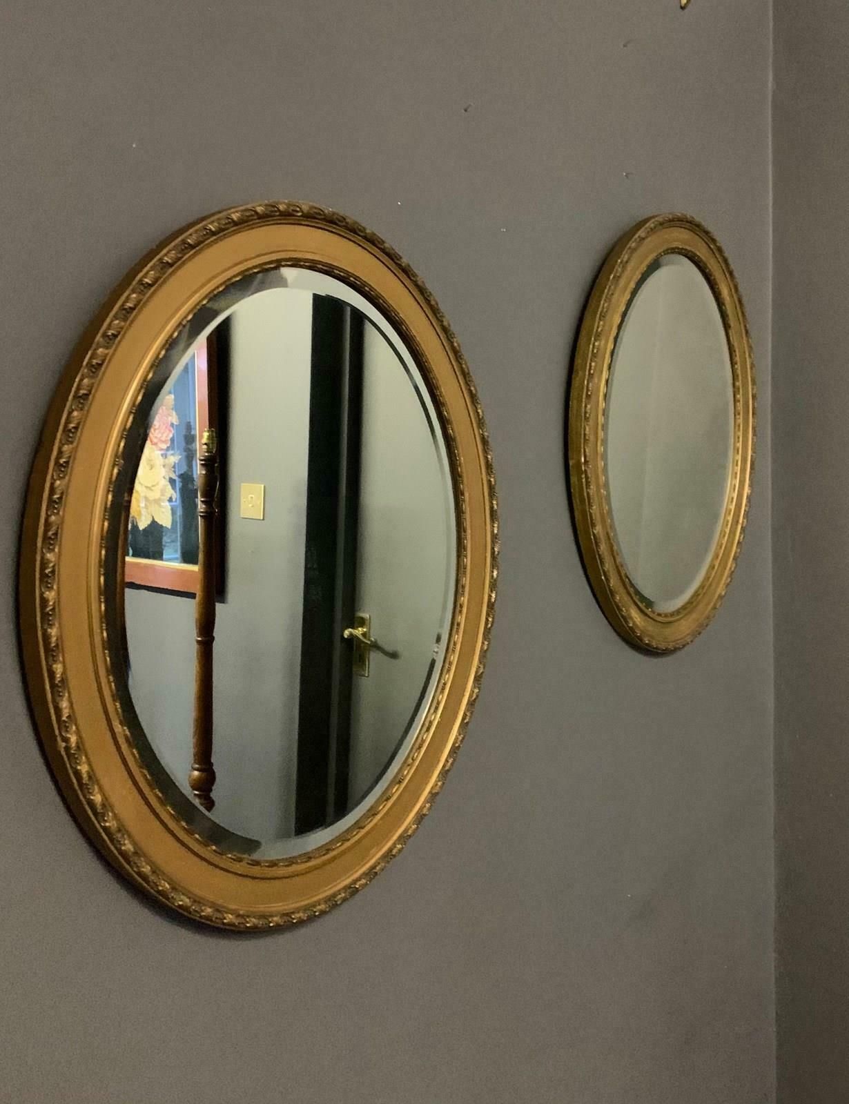 Pair Of Antique Gilt Framed Oval Mirrors