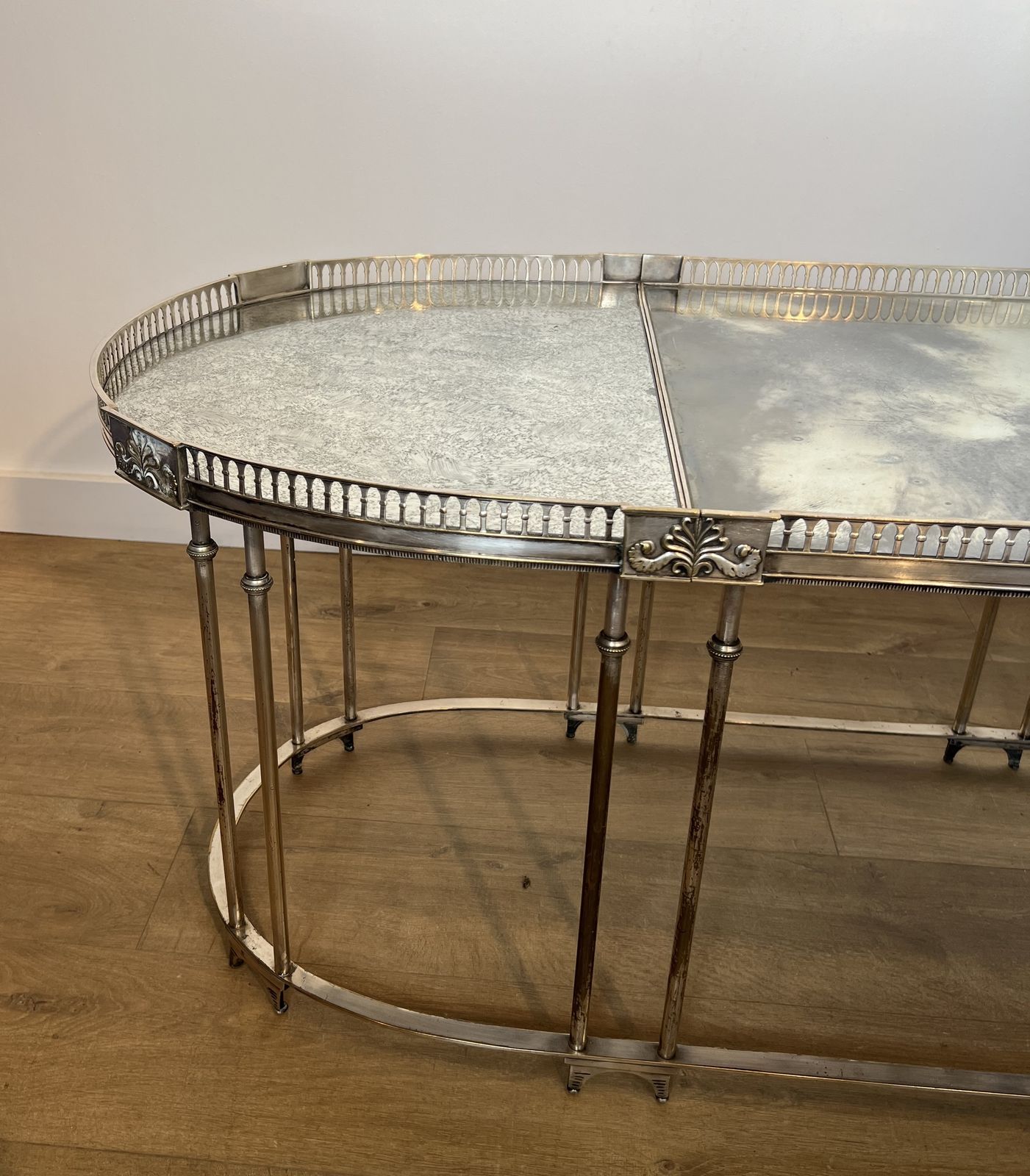 photo vintage Neoclassical Style Coffee Table In Silver Metal And Aged Mirror Tops