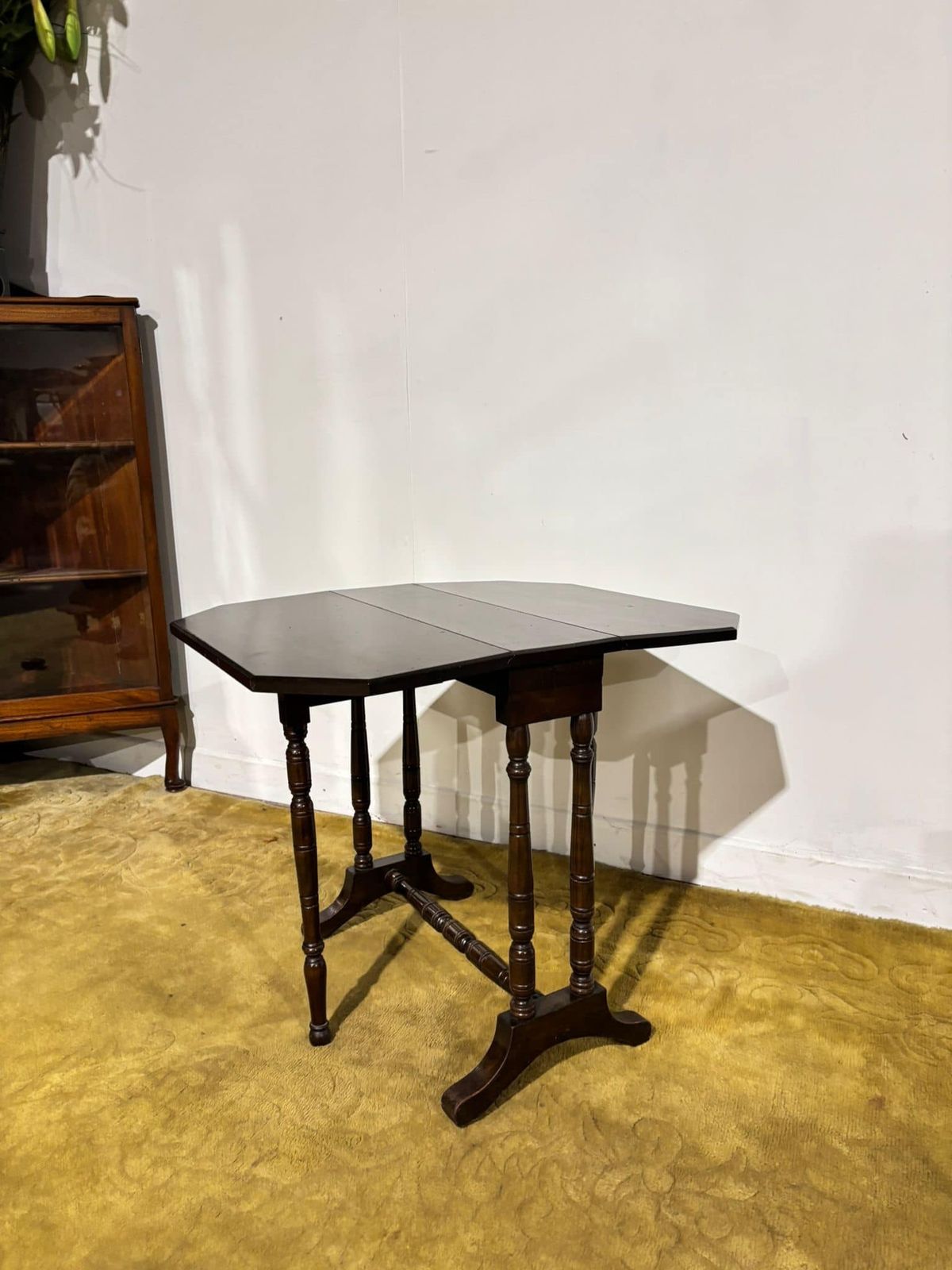 photo for sale Edwardian Mahogany Table Of Small Proportions Resting On Turned Legs.(Regent St, Goodyers London.W.)
