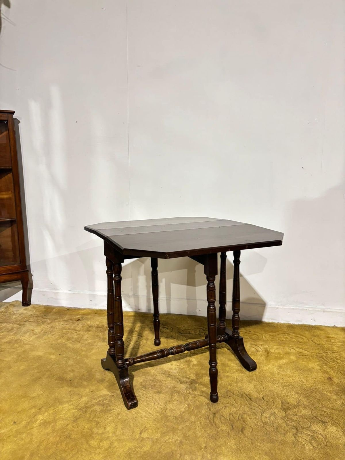 Edwardian Mahogany Table Of Small Proportions Resting On Turned Legs.(Regent St, Goodyers London.W.)