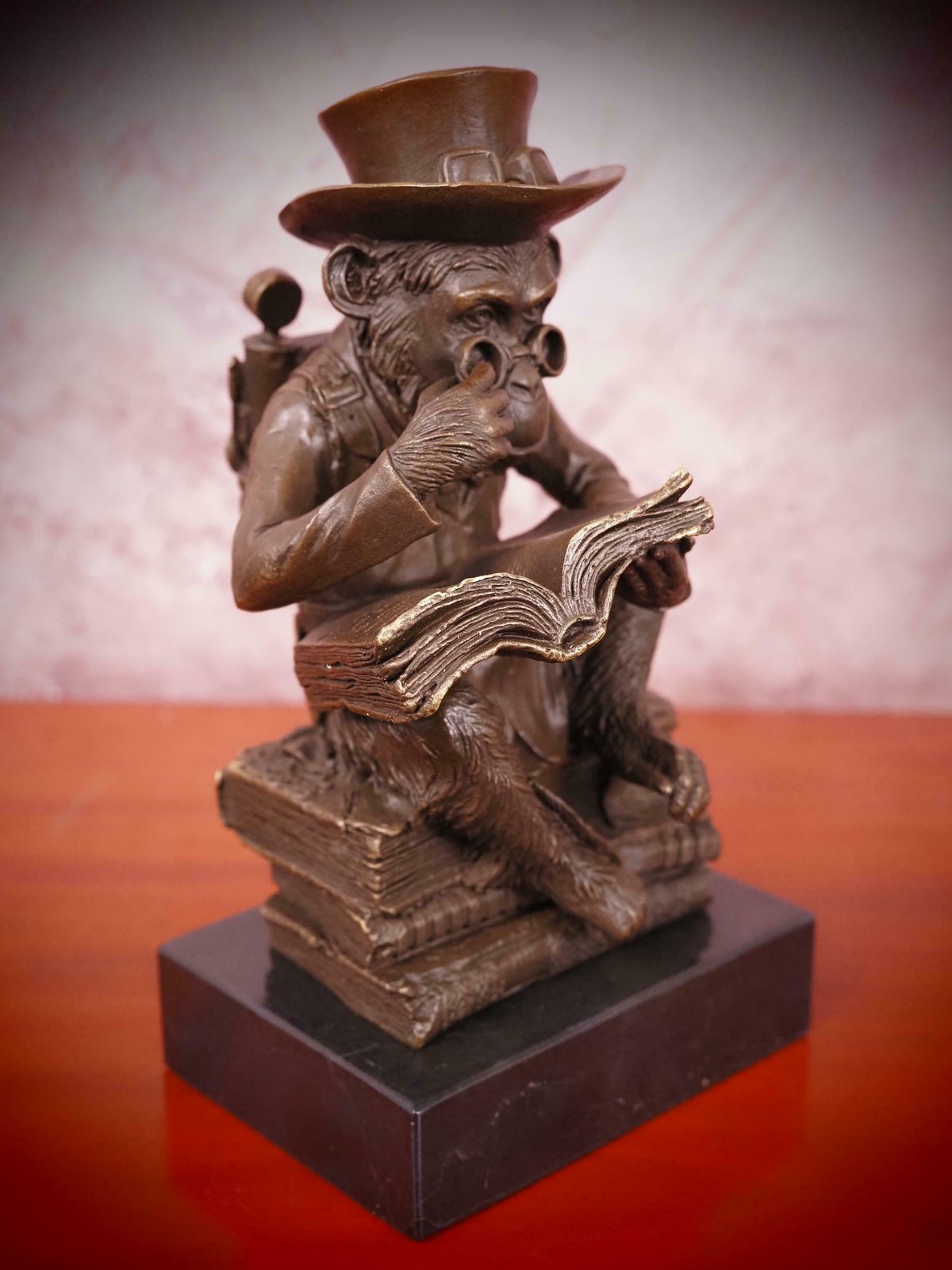 Bronze Steampunk Sculpture Of A Monkey On A Pile Of Books Philosophizing Monkey Statue Bronze photo furniture
