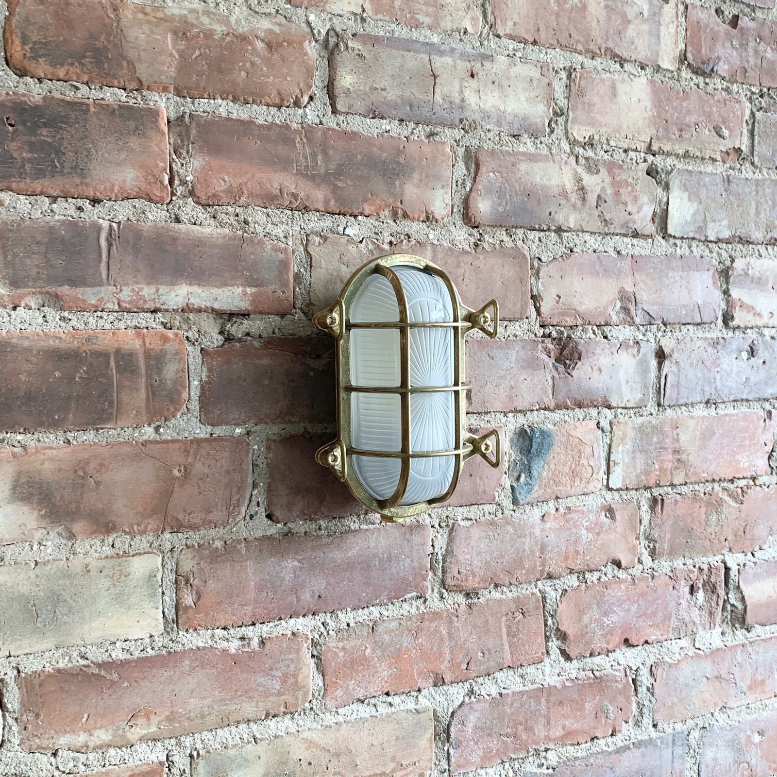 Contemporary Polished Brass Oval Bulk Head Wall Light photo 135.0