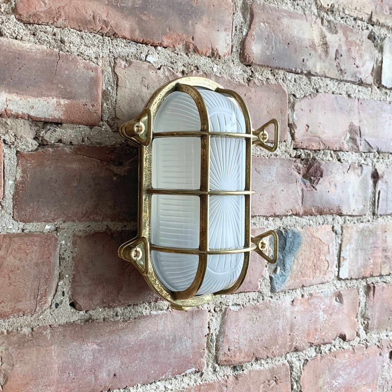 photo for sale Contemporary Polished Brass Oval Bulk Head Wall Light