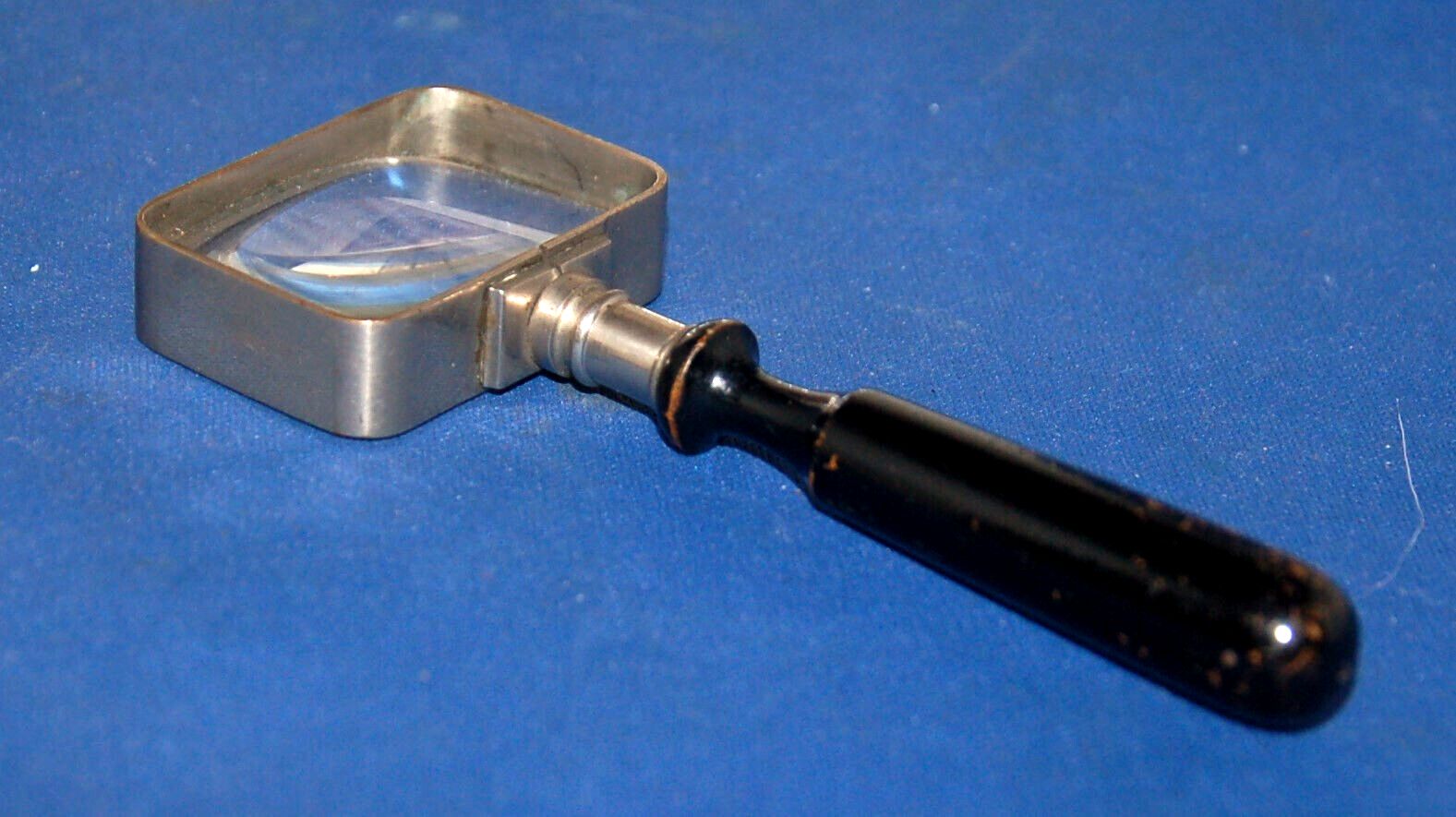 An Early 20th Century Rectanglar Magnifying Glass, Small Size, White Metal Frame photo furniture