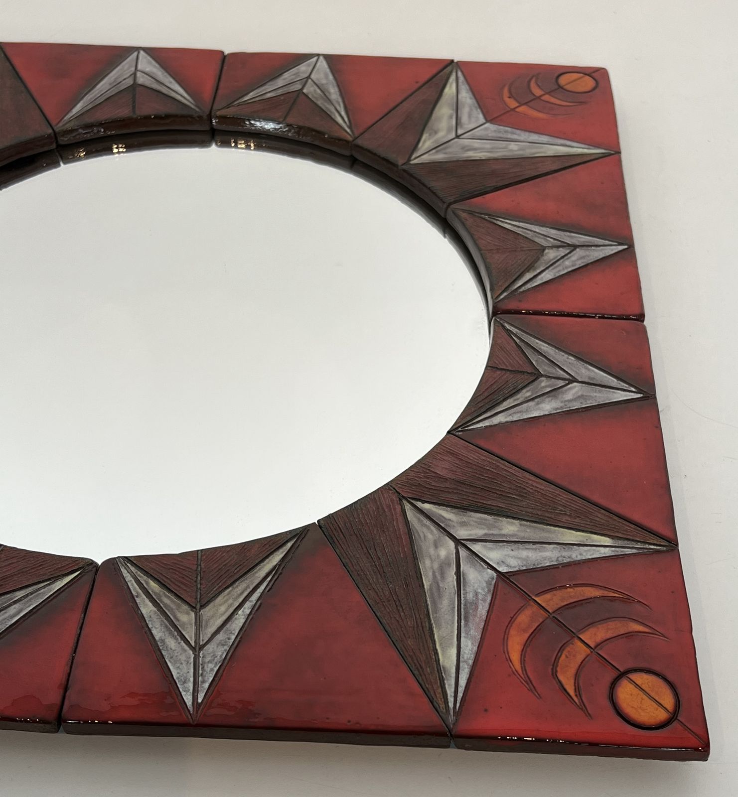 Ceramic Mirror Depicting A Stylized Sun On A Red Background Attributed To Oswald Tiberghien photo buy