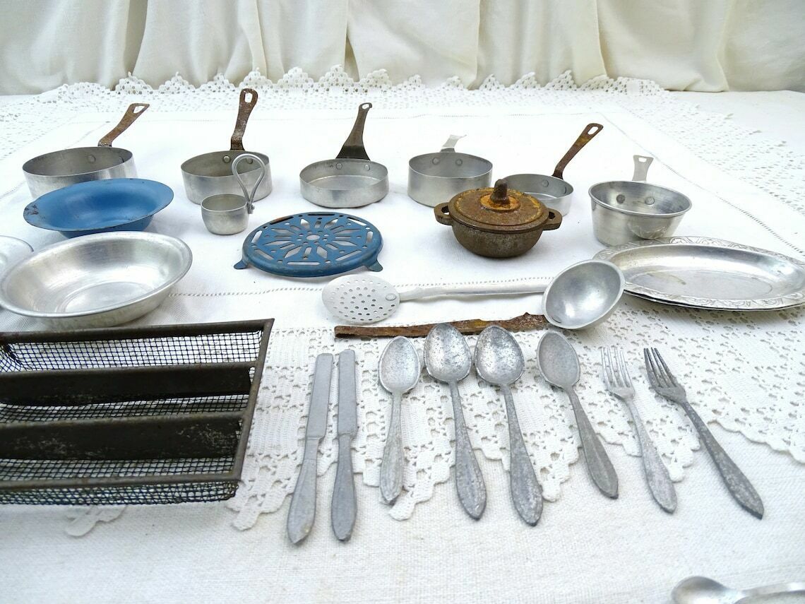 Vintage French Dolls Play Dinner Set With Enamel Trivet, Cutlery And Cast Iron Cooking Pot, Retro Childs Pretend Kitchen Toys, Kids Playing photo Home Decor