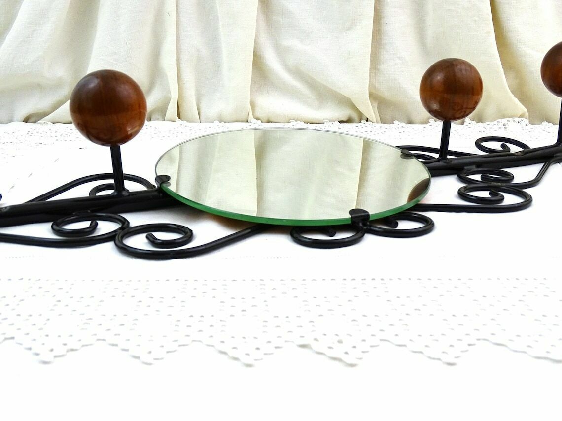 Vintage French Wall Mounted 4 Ball Hook Coat Rack With Round Mirror And Black Forged Metal Frame, Retro 1960s Hall Furniture From France photo furniture