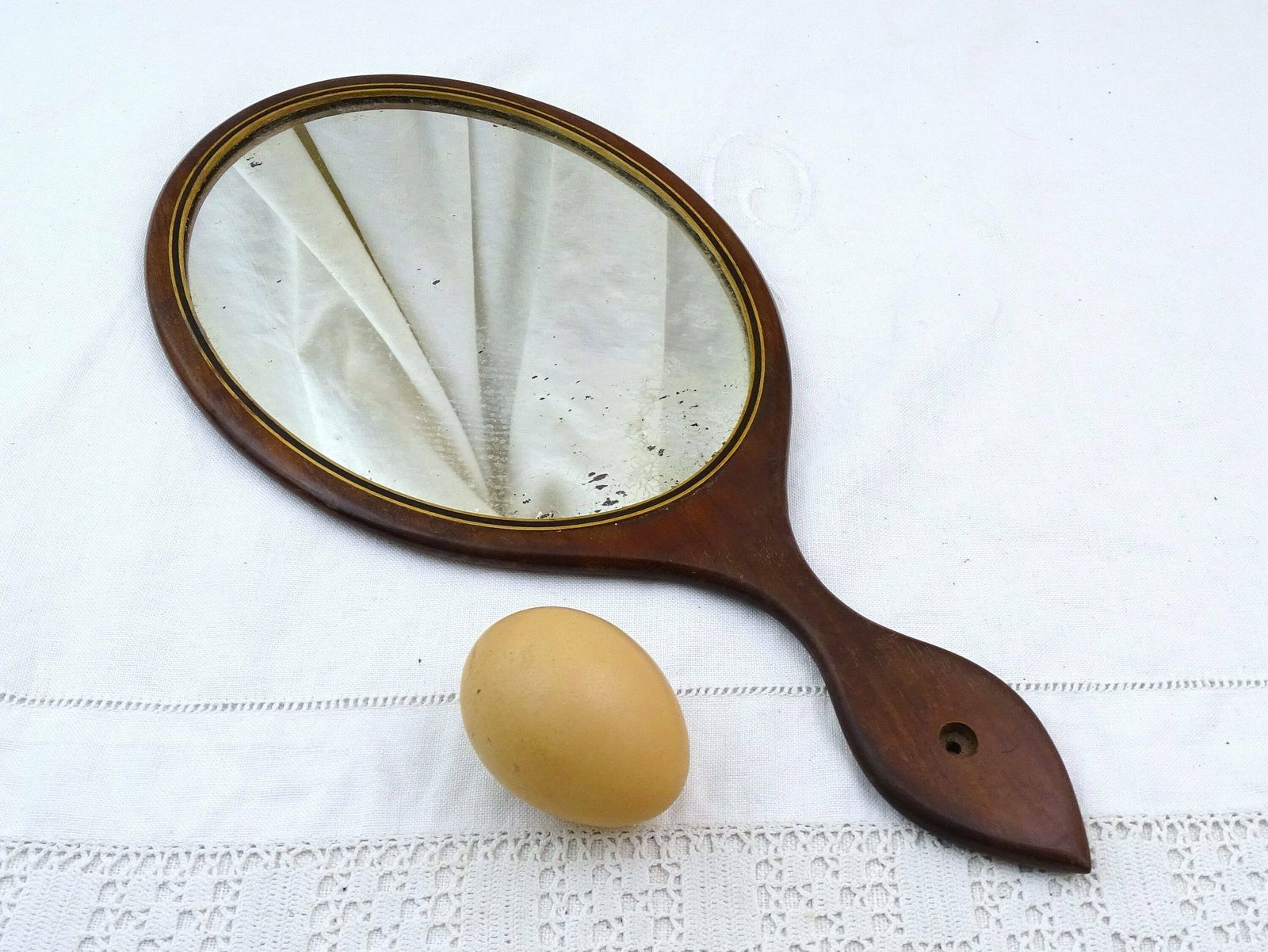 Large Antique French Wooden Distressed Oval Vanity Hand Mirror, Retro Boudoir Accessory From France, Old Make Up Looking Glass Made Of Ebony photo for sale