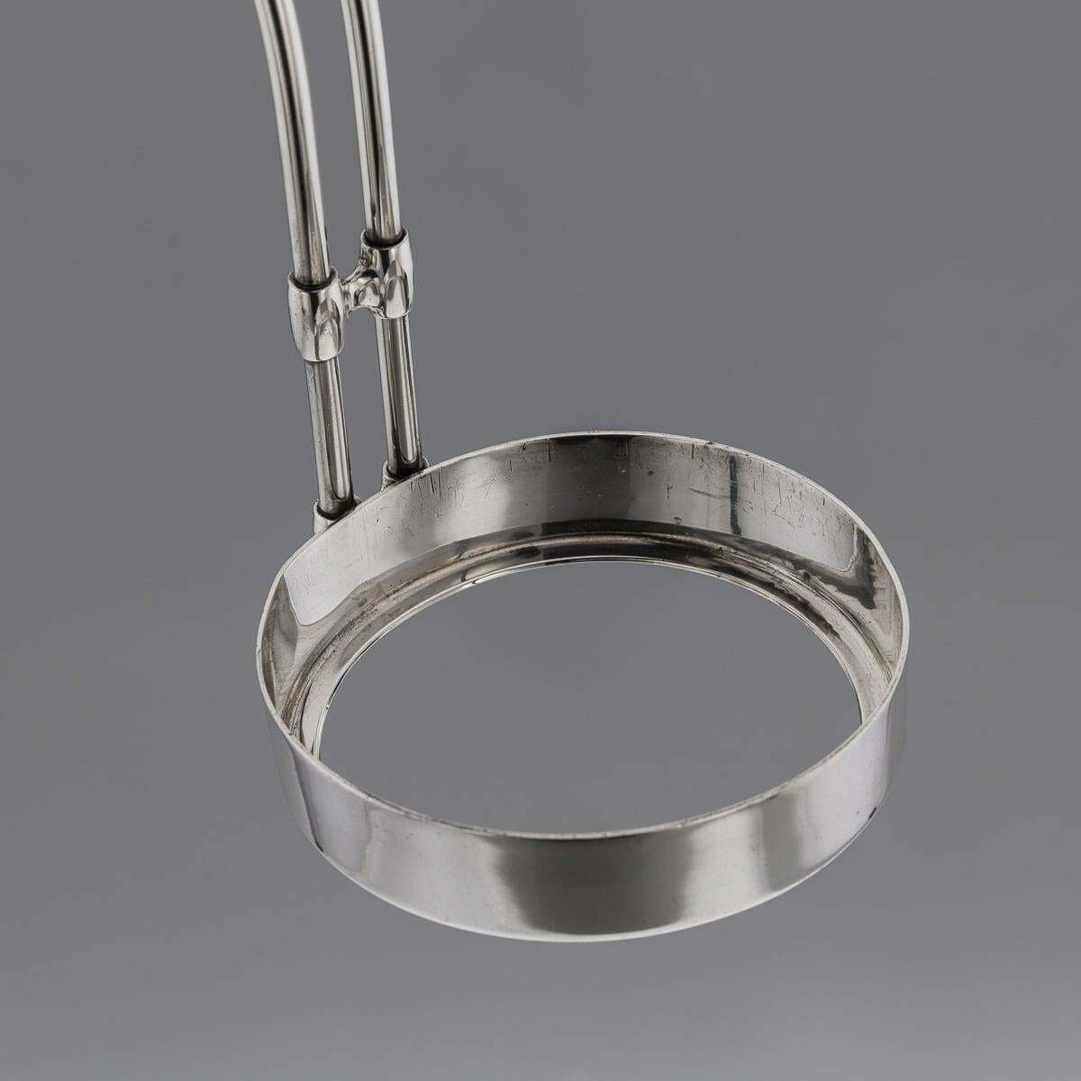 photo for sale 20th Century American Art Deco Cartier Solid Silver Wine Bottle Holder C.1920