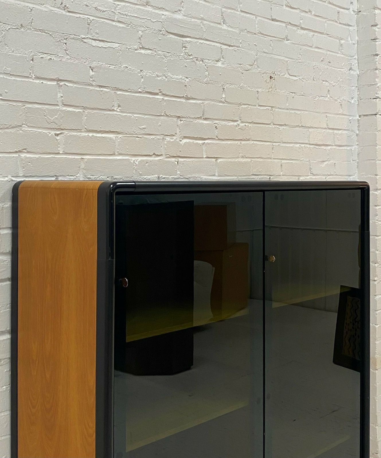 Mid Century Unifor Smoked Glass Cabinet, 1980. photo vinterior