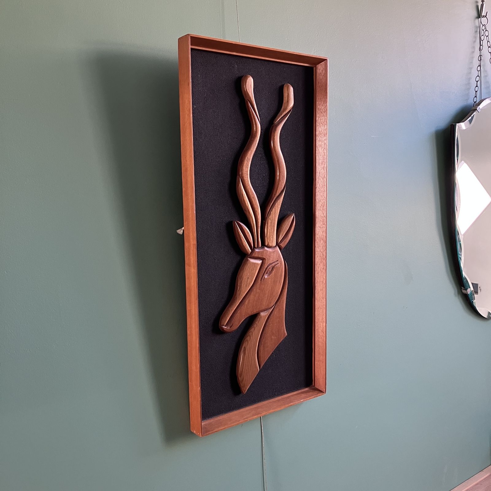 A Mid Century Teak Picture Of A Deer In A Teak Frame On Black Background photo for sale