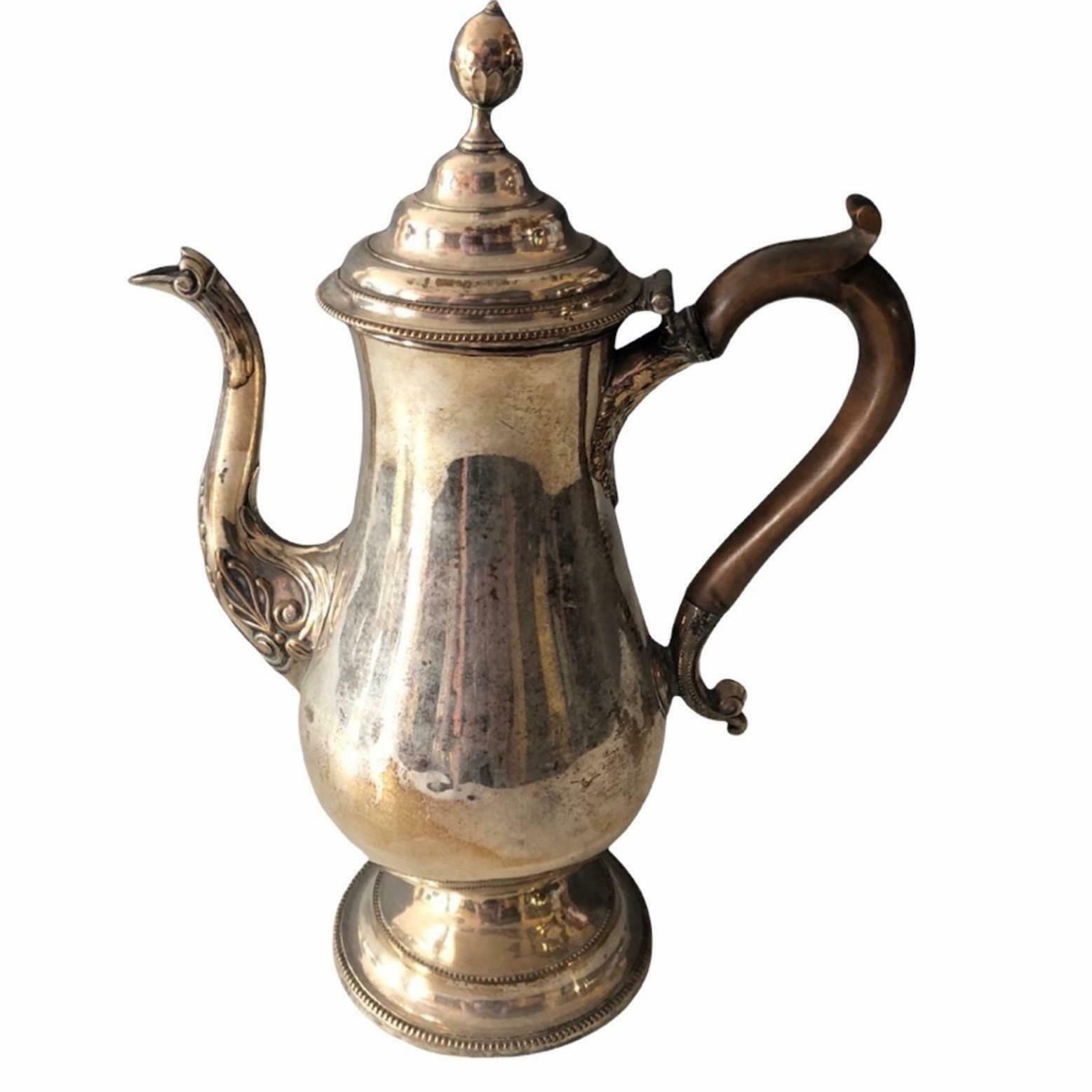 An 18th Century George III Old Sheffield Plate Coffee Pot Of Simple Form, Circa 1770. photo furniture