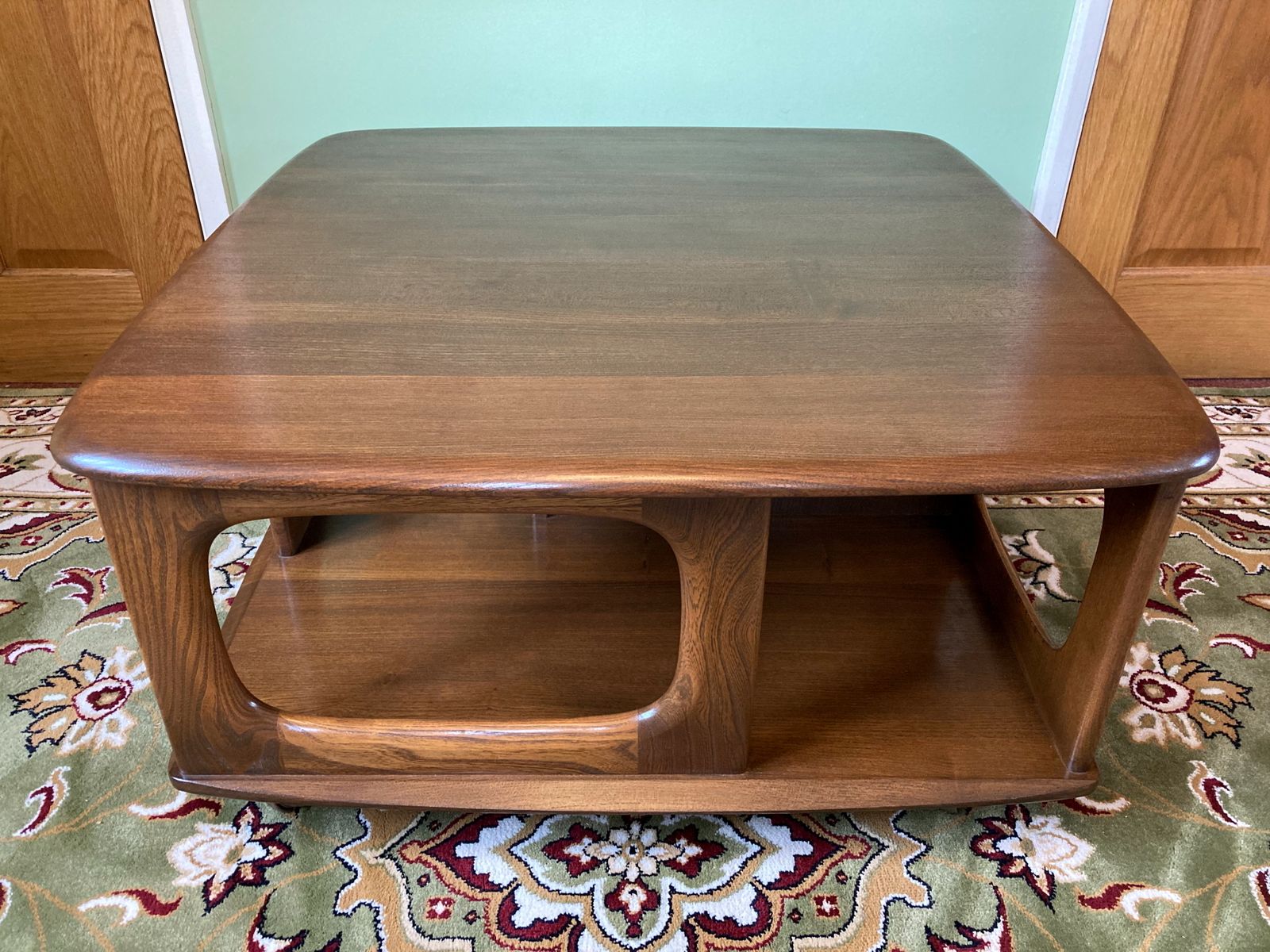 An Ercol Pandora Coffee Table In Golden Dawn Colour. photo buy